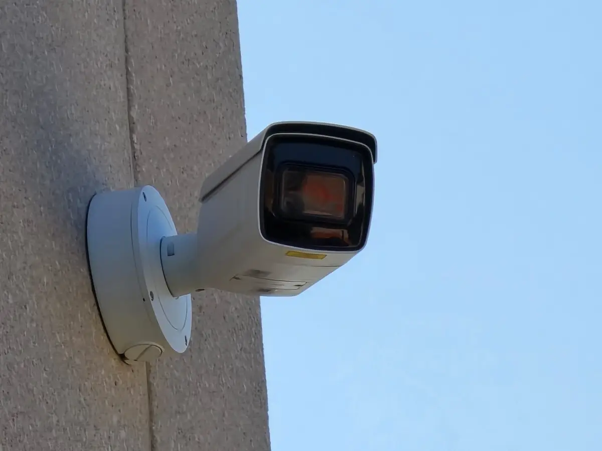 Bullet camera on the corner of a commercial building