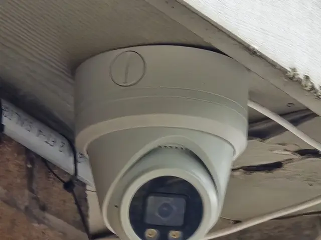 Close-up of a colour turret camera under a plaza canopy