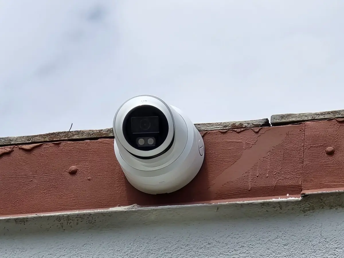 Colour turret camera on a building parapet