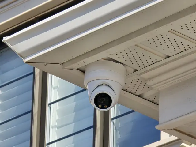 Turret camera under the soffit above a window